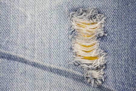 Jeans torn denim texture.