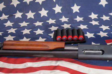 Shotgun American flag background.の写真素材