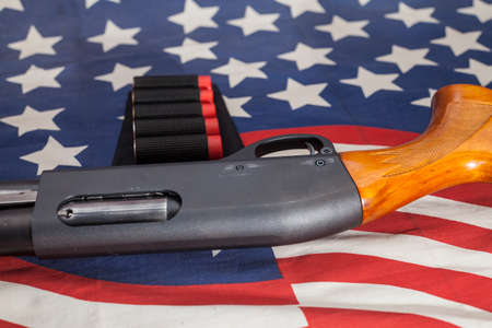 Shotgun American flag background.の写真素材