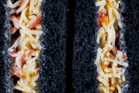 Delicious sandwiches black bread on white background.の写真素材