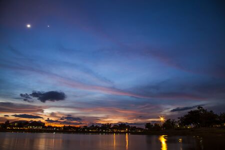 Red sunset vivid over the lake.の写真素材