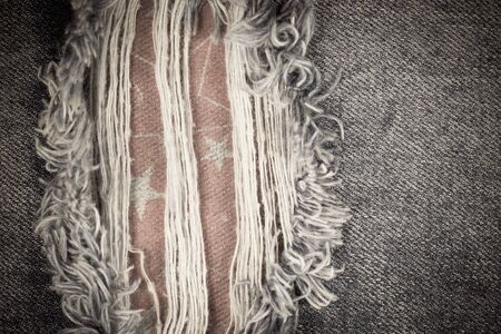 Torn denim vintage texture background.
