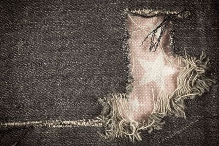 Torn denim vintage texture background.の写真素材