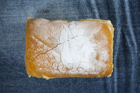 Butter bread sprinkle with icing on top.