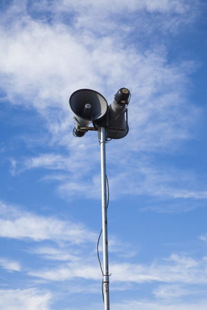 Loudspeaker cloudy blue sky background.の写真素材
