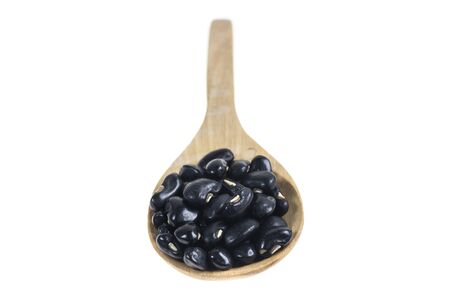 Black Eyed Peas in wooden spoon on white background.の写真素材