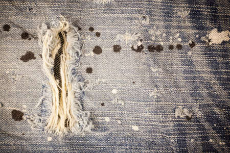 Torn denim dirty jeans textureの写真素材