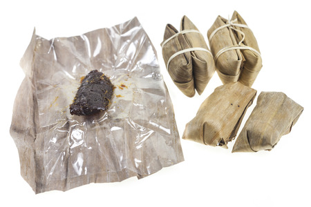 Dessert banana candy in banana leaf.の写真素材