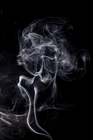 White smoke on black background.の写真素材