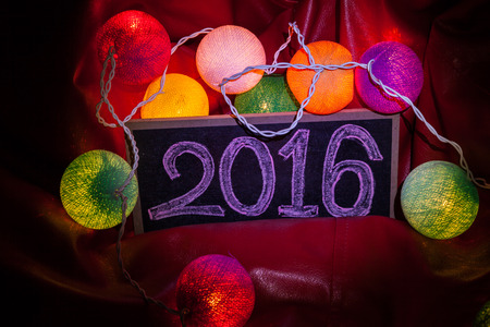 2016 New Year, 2016 write on Vintage blackboard lamp background.