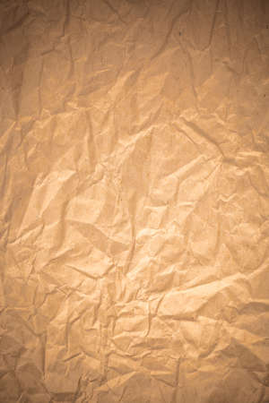 Brown crumpled recycle paper background.の写真素材