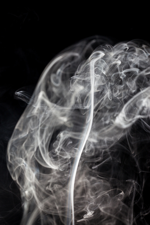 White smoke on black background.の写真素材