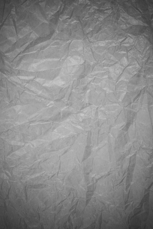 Gray crumpled paper recycling background.の写真素材