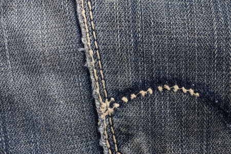 Blue jeans sewing line of closeup texture.