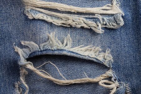 Textures ripped jeans background.の写真素材