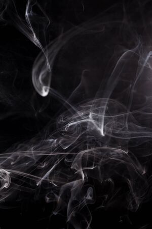 Smoke on a black background.の写真素材