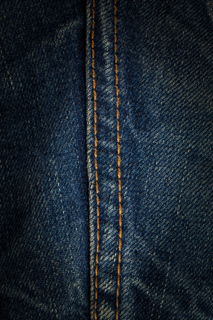 Sewing line of vintage blue jeans.の写真素材