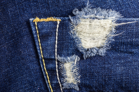 Texture ripped jeans.の写真素材