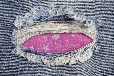 Jeans background, old jeans torn denim.