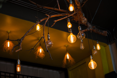 Vintage light bulb in the dark.の写真素材