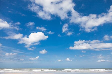 Wind, waves and cloudy in skyの写真素材