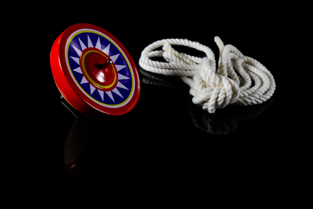 Spinning Top, Gyroscopes toy on black background.
