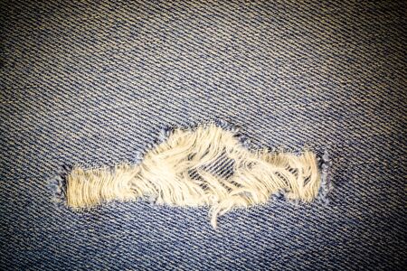 Vintage jeans torn denim background.の写真素材