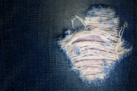 Vintage jeans torn denim texture.の写真素材