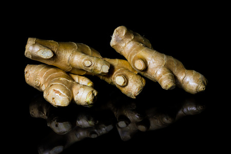 Ginger on black background.の写真素材