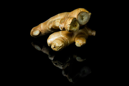 Ginger on black background.の写真素材