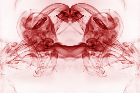 Red smoke movement on a white background.の写真素材