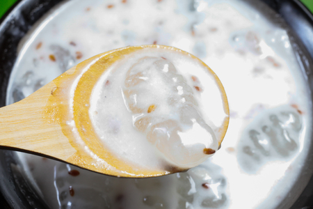 Caramelized crisps in coconut sauce. Thai dessert.の写真素材