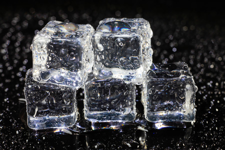 ice cubes on black background.