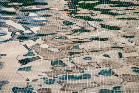 Patterns mosaic tile background in swimming pool.の写真素材