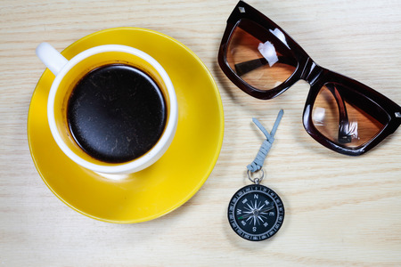 Glasses and coffee on Wooden Background.の写真素材