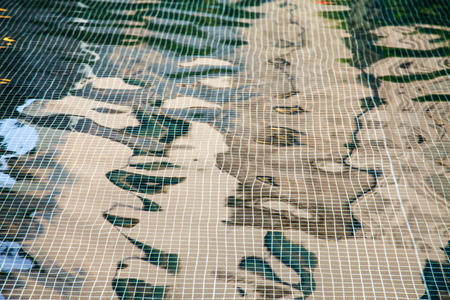 Patterns mosaic tile background in swimming pool.の写真素材
