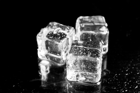 ice cubes on black background.の写真素材