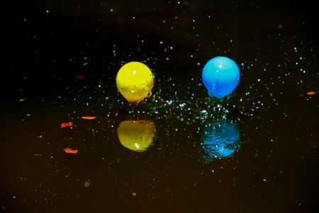 Colorful small balls floating in the pool.の写真素材