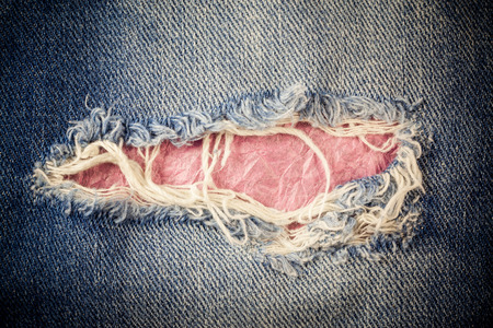 Vintage old jeans torn.の写真素材