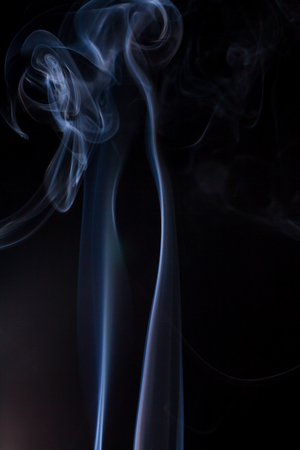 Smoke on a black background.の写真素材