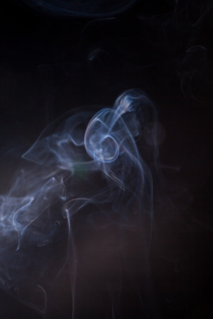 Smoke on a black background.の写真素材