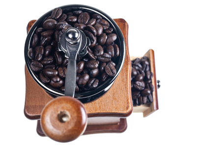 Vintage coffee grinder on a white background.の写真素材