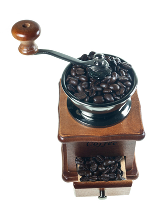 Vintage coffee grinder on a white background.の写真素材