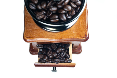 Vintage coffee grinder on a white background.の写真素材