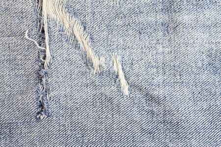 Jeans torn background, Denim texture.