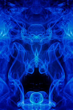 Blue smoke motion on black background.