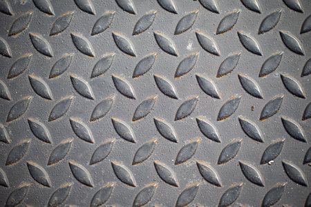 Patterned steel surface and rust.の写真素材