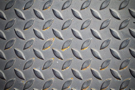 Patterned steel surface and rust.の写真素材