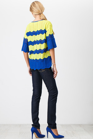 Woman in fashionable clothes on white backgroundの写真素材