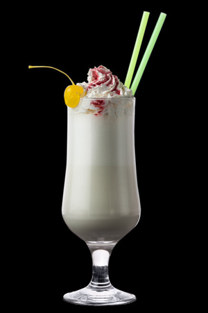 this is a milk cocktail on the black backgroundの写真素材